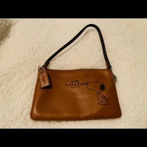 Coach commemorative Snoopy wristlet- brown